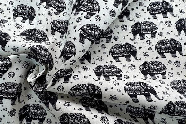 Black elephants on ivory, 100% cotton print