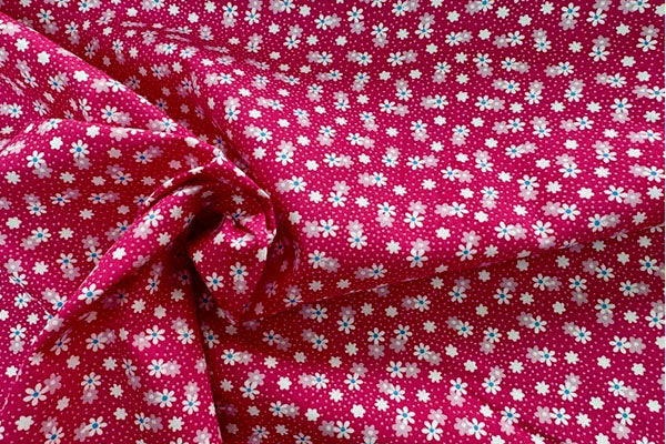 White daisies on cerise background